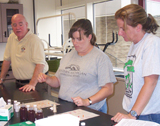 three-teachers-in-lab